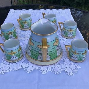 Hand painted French ceramic pitcher and 6 mugs
